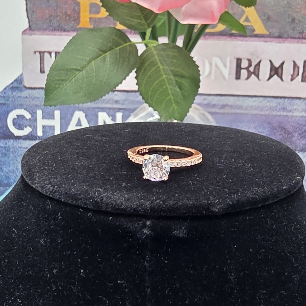 Radiant Rose Gold Ring with Sparkling Zirconia Stone